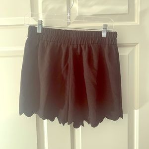 Black shorts with scallop detailing